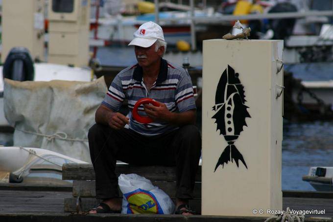 Chania port Fisherman - Crete, Greece