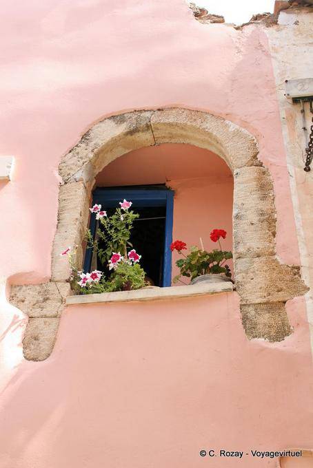 Geraniums on window Hania (Chania) - Crete, Greece
