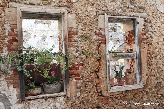 Hania (Chania) Flowers and uninhabited ruin - Crete, Greece