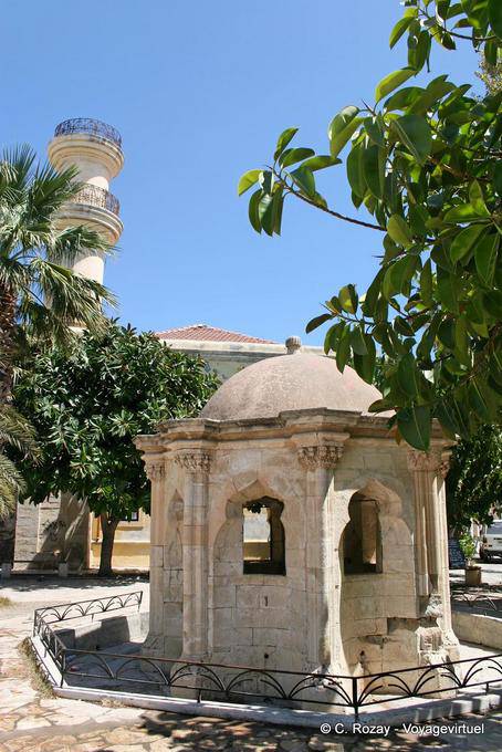 Court of the old mosque with fountain and minaret, Ierapetra - Crete, Greece