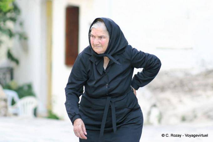 Cretan traditional outfit with black head scarf, Lassithi - Crete, Greece