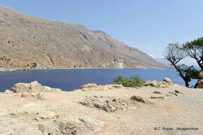 Dry land, peeled rock and overseas sea Loutro - Crete, Greece