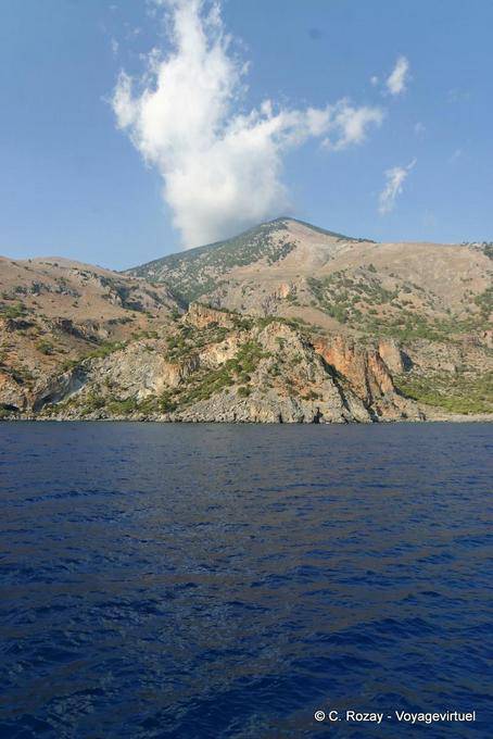Cloud rising over the mountain overlooking Agia Roumeli - Crete, Greece
