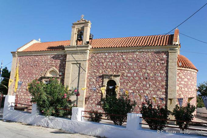 Little pink church in the plain of Messara - Crete, Greece
