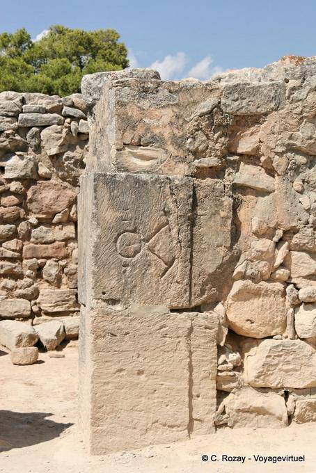 Sign carved in stone with an opening, Palace of Phaistos - Crete, Greece