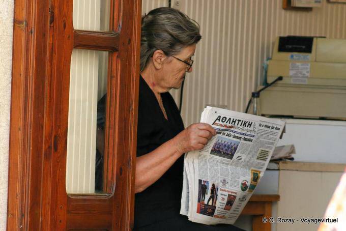 Reading the newspaper, Rethymnon - Crete, Greece