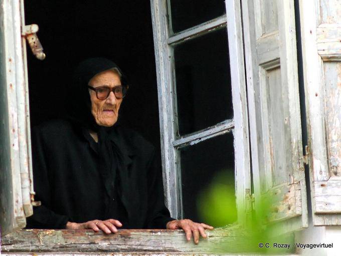 Rethymnon old at the window - Crete, Greece