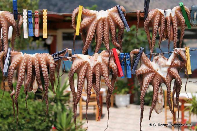 Spinalonga Plaka, dried octopus on the clothesline - Crete, Greece