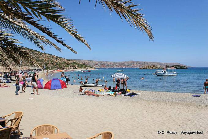 Vai palm beach crowded with tourists - Crete, Greece