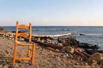 Lonely chair on the beach driftwood, Frangokastello, Crete.