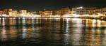 Panorama of the picturesque old port of Chania illuminated, Crete.