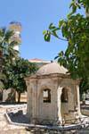 Court of the old mosque with fountain and minaret, Ierapetra, Crete.