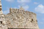 Walls and battlements rounded sandstone of the Venetian military architecture, Fort Koules, Heraklion, Crete.