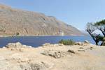 Dry land, peeled rock and overseas sea Loutro, Crete.