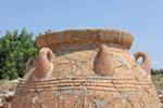 Solar Deco on a pithos used to store non-perishable agricultural commodities, Malia, Crete.