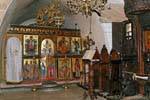 Small nave of the church wall with Byzantine icons, Moni Toplou, Crete.