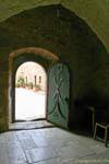 Arch and iron gate in the monastery of Toplou, Crete.