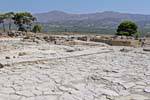 Paving the relatively well preserved floor of the Palace of Phaistos, Crete.