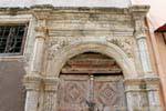 Rethymnon Street Klidi gate with decorated spandrels, Crete.