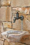 Spili fountain on tap copied from the ancient, bishopric, Crete.