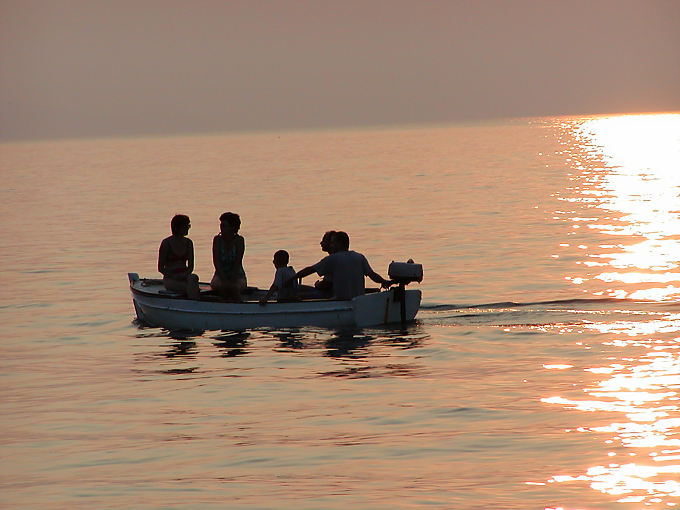 Family boat trip on the gold of the sea, island of Krk, Croatia