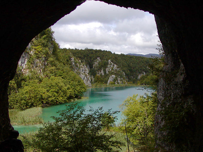 Small lake seen from the entrance of the cave Supljara, Plitvice, Croatia