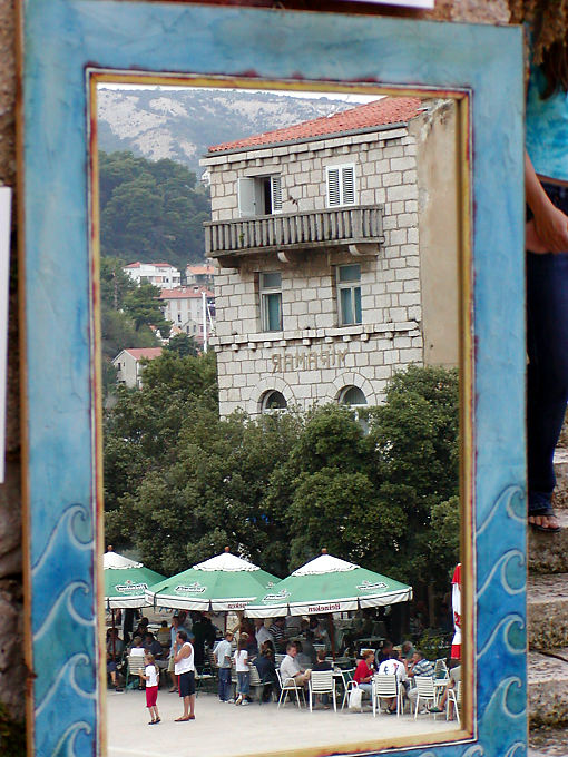 Mirror reflecting a spot of Rab, Croatia