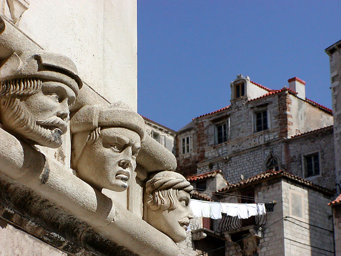 Heads carved on the Saint-Jacques Cathedral in Sibenik, Croatia