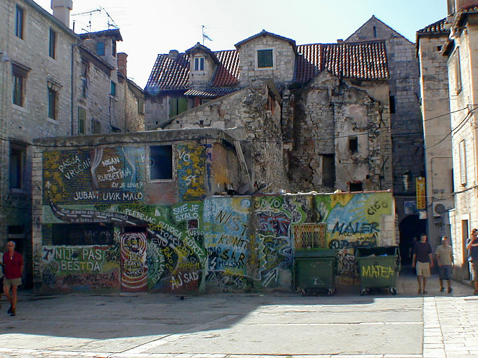 Tags on walls and old house, Split, Croatia