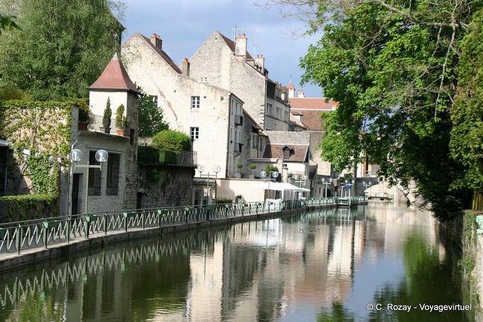Walk along the water in the old city of Dole - France