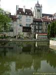 Facades reflected in the Rhone-Rhine canal, Dole, France.
