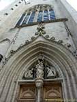 Angels and virgin sculpted on the portico of the church of Notre Dame, Dole, France.