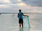 Fisherman nets to Calle Bahia San Andres, Boca Chica, Dominican Rep..