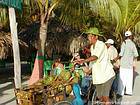 Cocos peddler and his tricycle, Boca Chica, Dominican Rep..