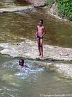 Kids swimming in the river, Dominican Rep..