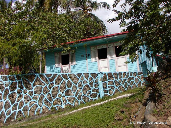 It is a blue house with matching wall, Dominican Rep.