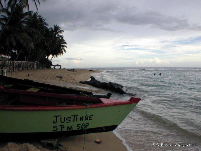 Justinne boat on the sand of the beach, Juan Dolio, Dominican Rep.