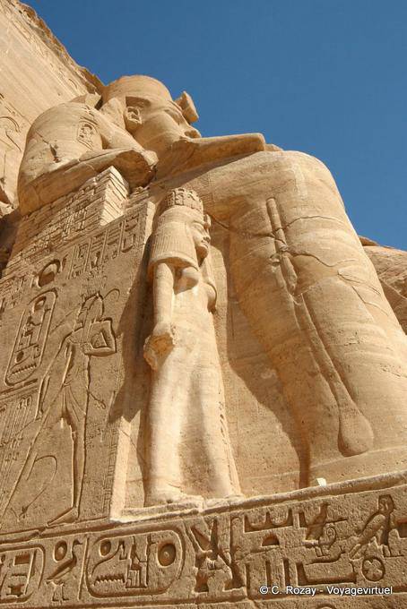 Queen Nefertari at the foot of his king, Abu Simbel - Egypt
