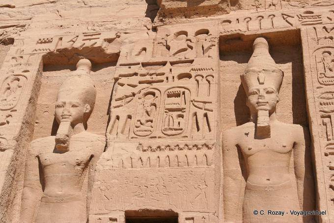 Hieroglyphics and statues of Ramses II, facade of the Temple of Queen Nefertari, Abu Simbel - Egypt
