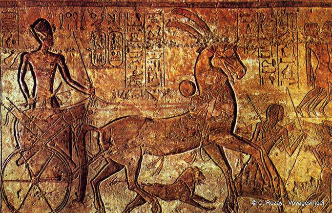 Battle of Kadesh, Ramses in his chariot with a lion leaping at his side, Meha temple Abu Simbel - Egypt