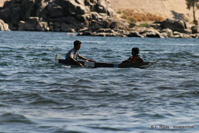 Children of the Nile in a mini-boat, Aswan - Egypt