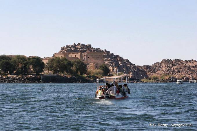 Arrival of tourists to Philae by the Nile - Egypt