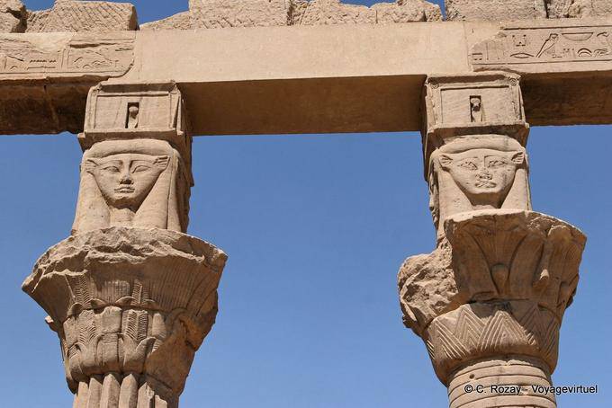 Pillars supporting capitals depicting the Goddess Hathor, Temple of Philae - Egypt