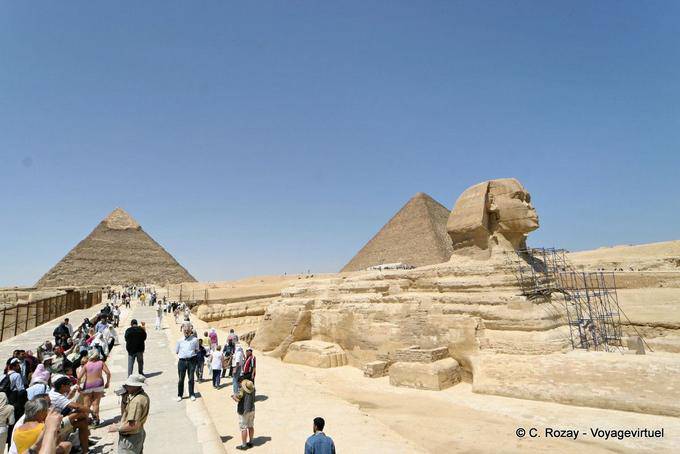 Sphynx in the path of the Giza pyramids - Egypt