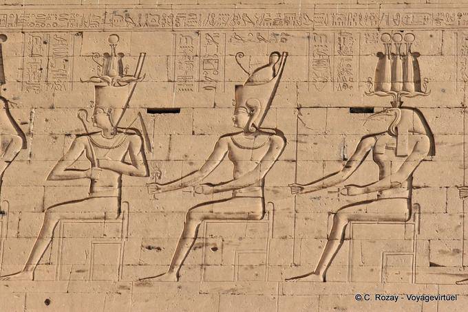 Representations of seated deities side of the pylon, Edfu temple - Egypt
