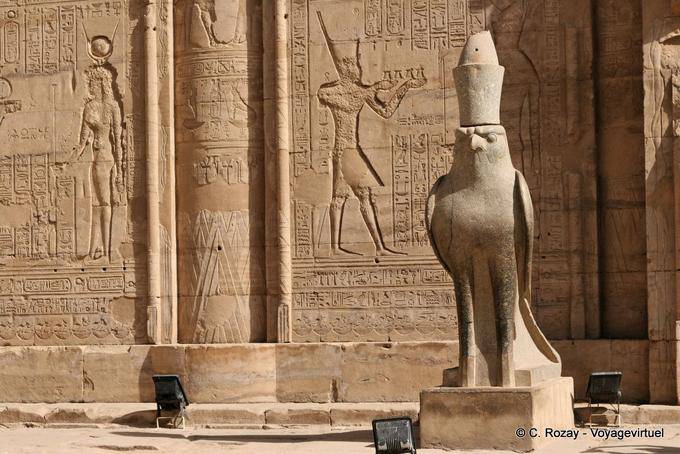 Statue of Horus wearing the crowns of Upper and Lower Egypt (granite), entrance to the pillared hall, Edfu - Egypt