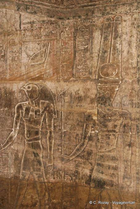 Reliefs on the wall of the Holy of saints, the temple of Edfu - Egypt