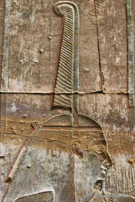Detail of a relief showing the headdress of the pharaoh, the temple of Edfu - Egypt