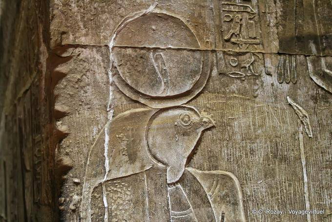 Horus, son of Osiris and Isis, wearing the moon and sun, bas-relief, temple of Edfu - Egypt