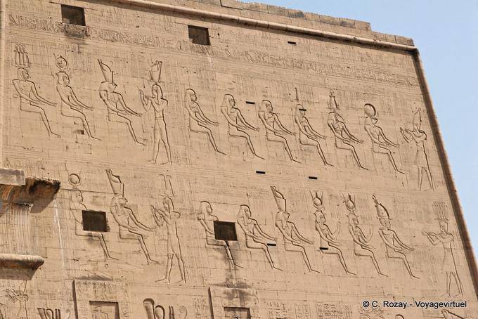 View on the right upper part of the outside of the tower, temple of Edfu - Egypt